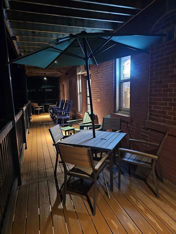 The Deck — umbrella table seating