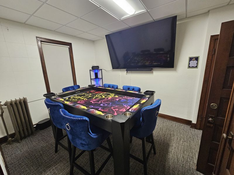 Stash's Den — elevated A/V gaming room