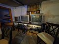 The Depths — CRT wall with retro consoles (PS2, N64, GameCube, SNES, Dreamcast, Genesis)