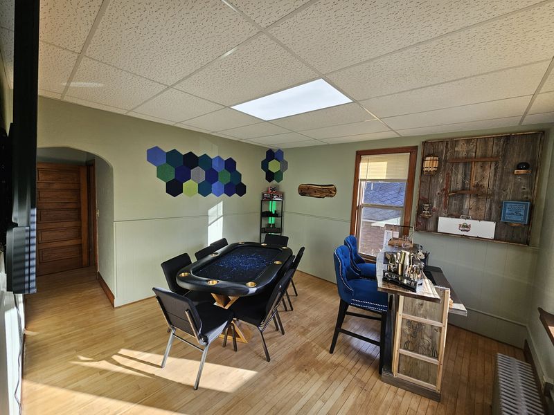 The Lodge — suite with custom poker table & bar