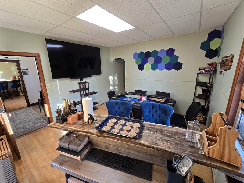 The Lodge — felt-top poker table, bar and big screen