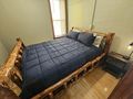 The Lodge — log cabin bedroom