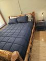 The Lodge — log cabin bedroom