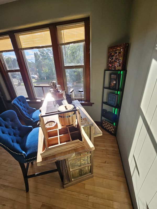 The Adventurer's Rest — live-edge cocktail bar and stools